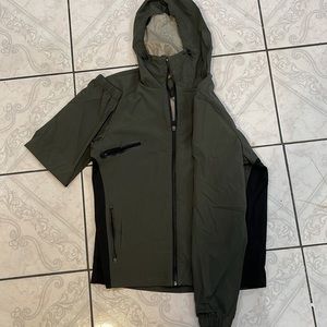 Dark green lightweight windbreaker by Ourcaste Size:M